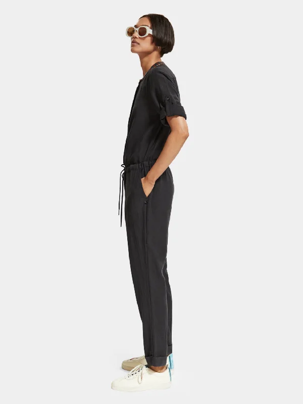 Jumpsuit with arrow head trim